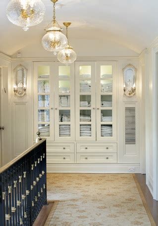 Find a local artisan to build custom bathroom cabinets here. Glass Front Linen Cabinet - Traditional - entrance/foyer ...