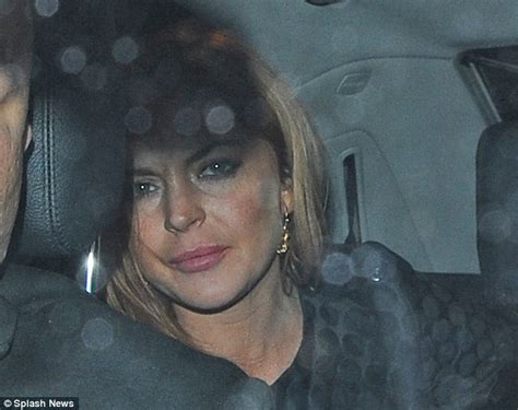 Lindsay Lohan Smokes Amid Fears Naked Photos Could Be Leaked From