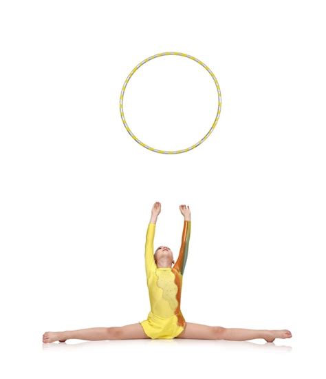 premium photo girlgymnastthrows up hula hoop