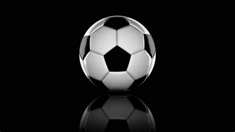 4k Looping Animation A Soccer Ball On Black Background Stock Footage