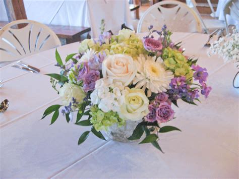 Beautiful Centerpiece Created With Lavender White Cream