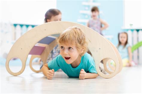 Cute Children Playing In Kindergarten Stock Image Image Of Active