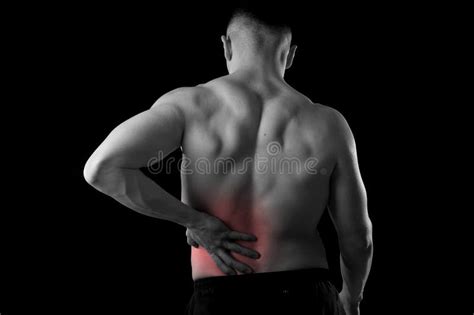 Young Muscular Body Sport Man Holding Sore Low Back Waist Suffering