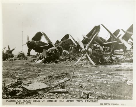 Destroyed airplanes on the deck of the USS Bunker Hill off the coast of
