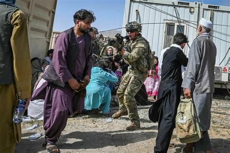 Kabul Airport Plunges Into Chaos As Taliban Patrol Capital Wtop News