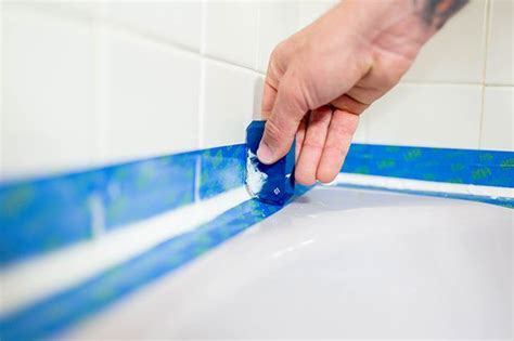 With a few tools from your local hardware store. How to Replace Bathtub Caulk | Bathtub caulking, Caulking ...