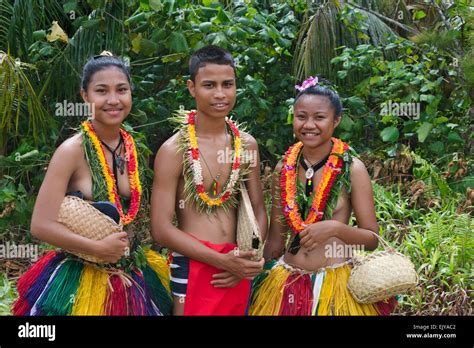 Yapese Girls And Boy In Traditional Clothing Carrying Hand Bags Yap
