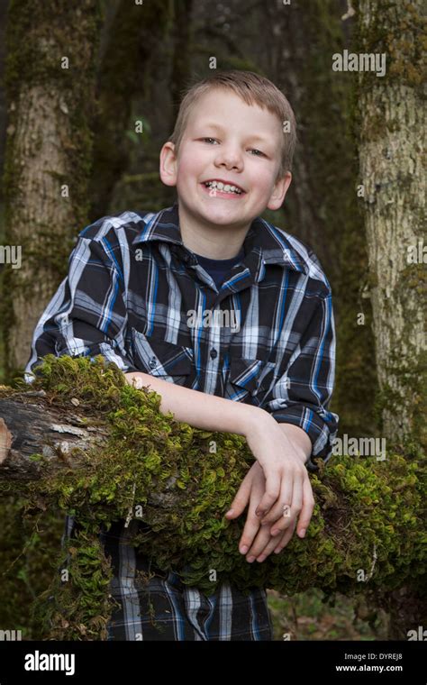 Portrait Of A Young Happy Boy Outdoors Stock Photo Alamy