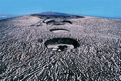 An Aerial View Of The Summit Of Mauna Loa With Mauna Kea In Background