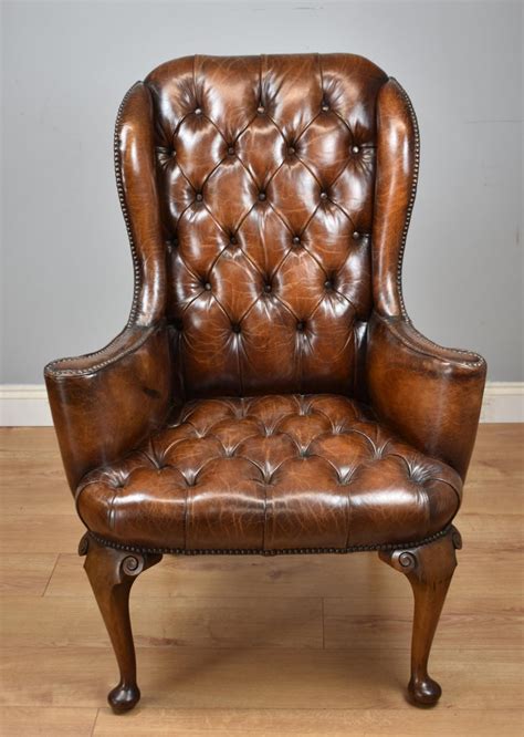 An office chair is a piece of elegant furniture; 20th Century English Hand Dyed Distressed Brown Leather ...
