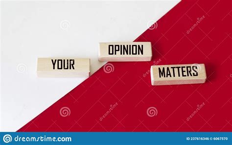 Your Opinion Matters Words From Wooden Blocks With Letters On A White