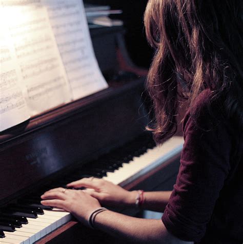 Girl Playing Piano Photograph