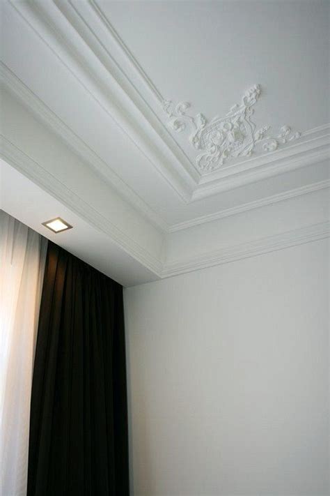 Plaster ceiling with wooden & divider design. Plaster Ceiling Design + Architectural Mouldings | Laurel Home