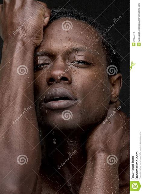 Sexy African American Man With Water On Face Royalty Free