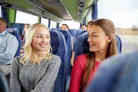 Happy Young Women Talking In Travel Bus Stock Image Image Of Girl