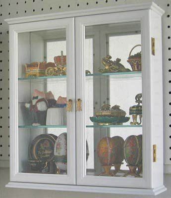 The most common curio cabinet with glass doors material is wood. Wall Mounted Curio Cabinet / Wall Display Case with glass ...