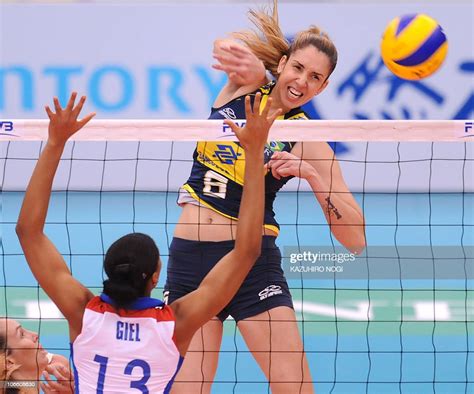 brazil s thaisa menezes spikes the ball over cuba s rosanna giel news photo getty images