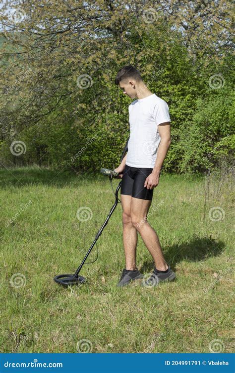 Man With Metal Detector Searching For Treasures Stock Image Image Of