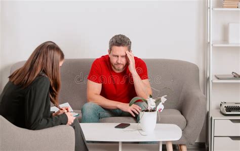 Psychologist Helping Young Man To Solve Men Problems Depressed Middle