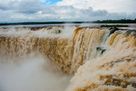 Tourists Visiting The Devil S Throat Waterfall In The Iguazu Falls One