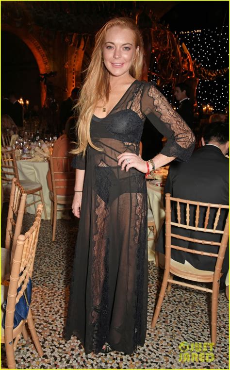Lindsay Lohan Flashes Black Bra Underwear At FIA Formula Dinner