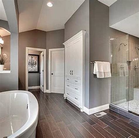The marble floor slopes down into the shower, so there is no threshold to step over. Tips for a Shower Remodel | Remodel Works