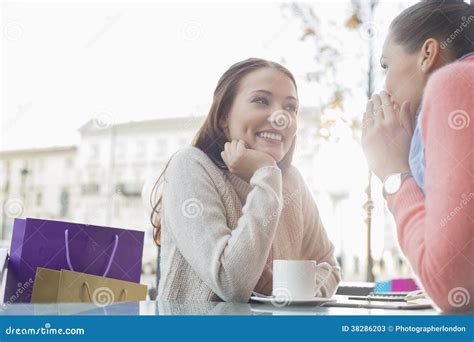 Happy Female Friends Gossiping At Outdoor Cafe Stock Image Image Of Drink Communications