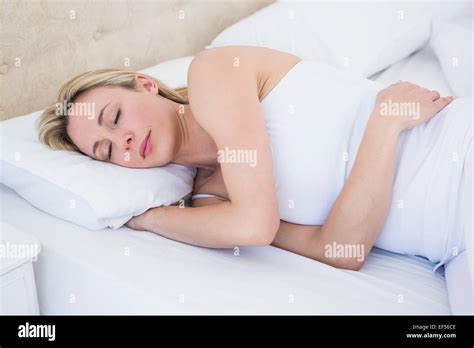 Pretty Blonde Woman Sleeping In Bed Stock Photo Alamy