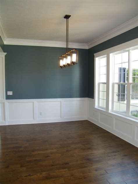 Open homes photography show more show less 20 of 30 tall wainscoting, a bar and gas fireplace highlight the living room. Pin on Home decor