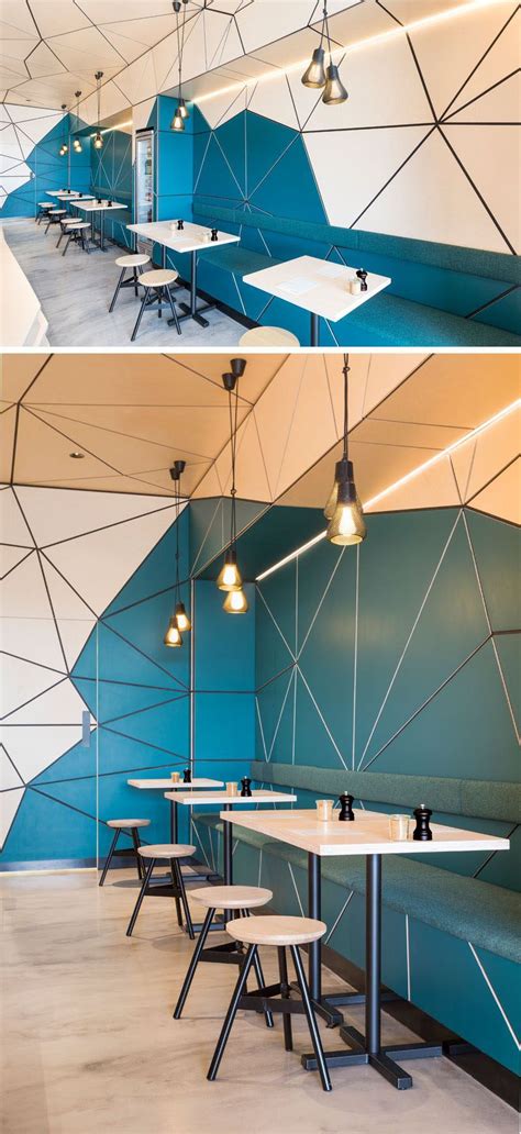 The Interior Of This Cafe Is Covered In Geometric Panel Shapes Modern