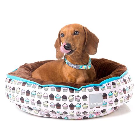 Your pet doesn't just run all day. FuzzYard Cupcakes Reversible Pet Bed Small