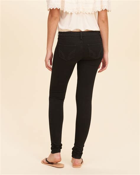 hollister low rise super skinny jeans in black lyst