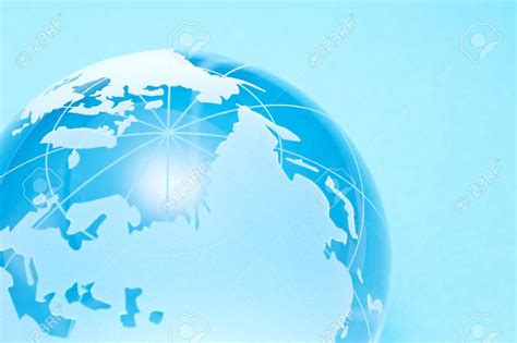 Free Download Close Up Of Glass Globe On Light Blue Background Stock