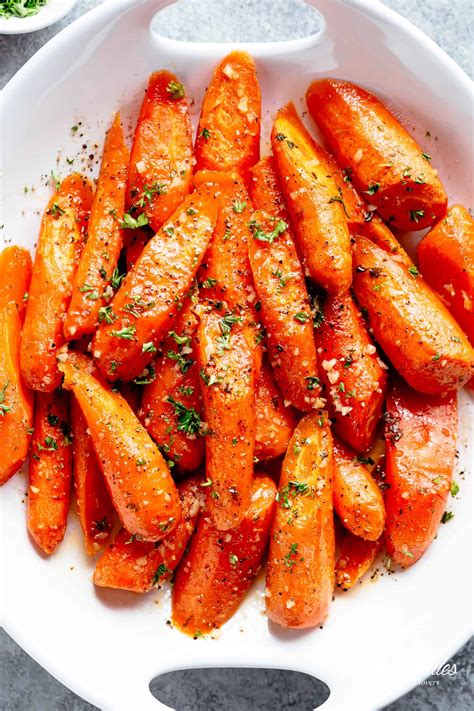 Watch how to make irresistible roasted carrots in this short recipe video! Honey Garlic Butter Roasted Carrots - Cafe Delites