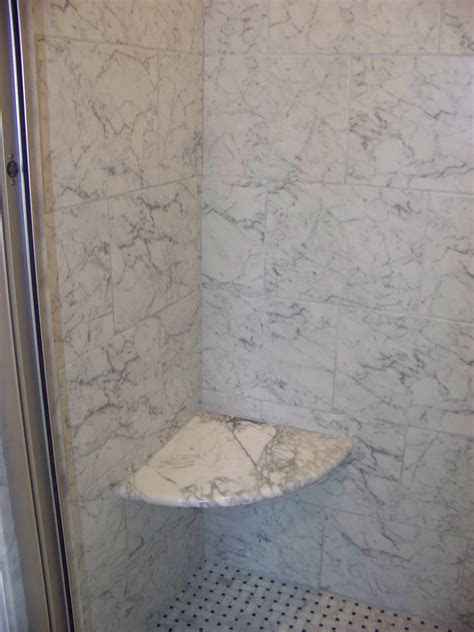Carrera marble bathrooms with floating seat cushions. Custom carrera marble corner shower seat. | Shower seat ...