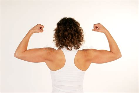 Female Fitness Instructor Flexing Arm Muscles Stock Photo Image Of