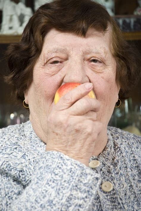 Close Up Senior Eat An Apple Stock Image Image Of Caucasian Bite