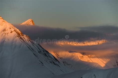 Wonderful View Of Winter Mountain Hills Covered With Snow And Shiny Sun