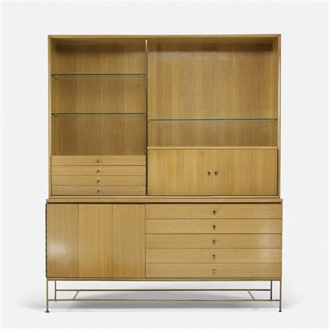 He knew his way around proportions—and mastered modularity the planner group series touted clean lines and simplicity, but what sets it apart is its modularity. Paul McCobb; Walnut, Glass and Brass 'Irwin Collection ...