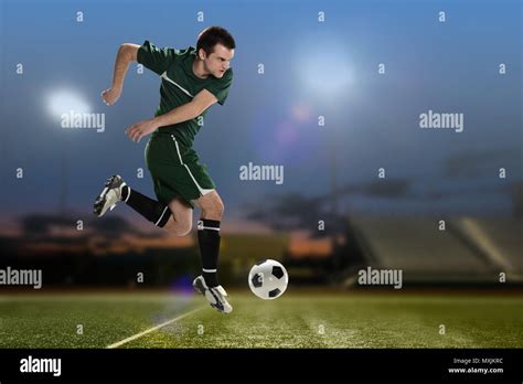 Man Kicking A Ball Hi Res Stock Photography And Images Alamy
