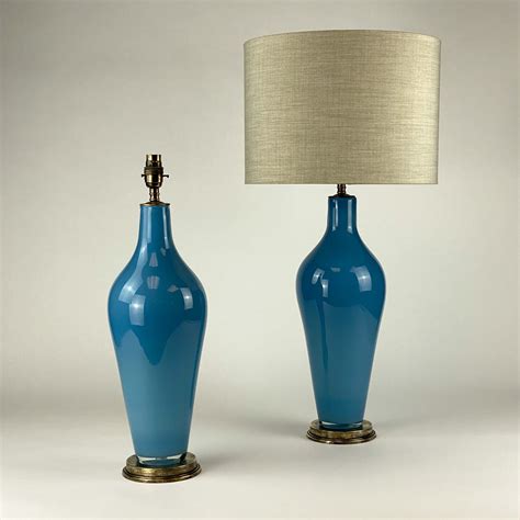 Pair Of Medium Sky Blue Standard Glass Lamps On Antique Brass Bases T6999 Tyson
