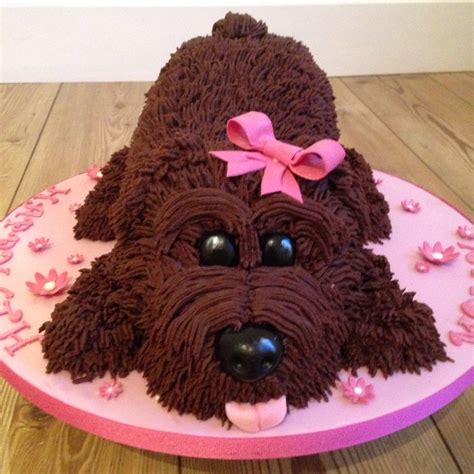 Cats can stay in the kitty cottage with has 24/7 care, complimentary pheromones, litter. Chocolate dog shape cake … | Puppy cake, Dog cakes, Cake ...