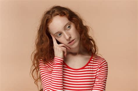 Premium Photo Redhead Female Looking Bored And Exhausted In Difficult Situation