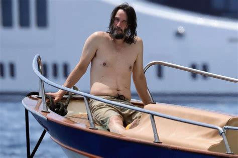 Shirtless Keanu Reeves Lounges On A Boat In Italy See The Photos