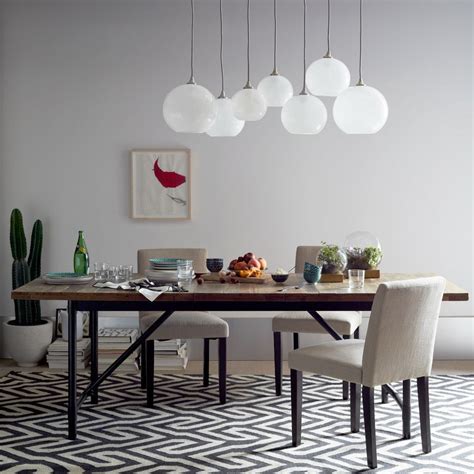 Constructed of reclaimed wood, this substantial table showcases a modern rustic vibe and comes equipped with bench seating. West Elm. Emmerson Industrial Expandable Dining Table (With images) | Expandable dining table ...
