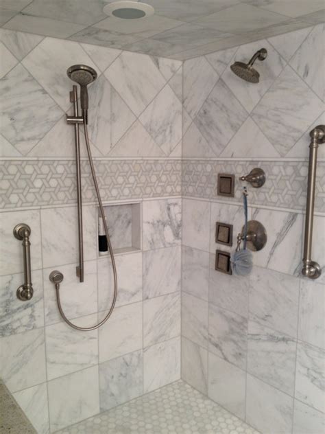 Check out our exclusive collection of bathroom tiles for small and large bathrooms. White bathroom with marble tile - Traditional - Bathroom ...