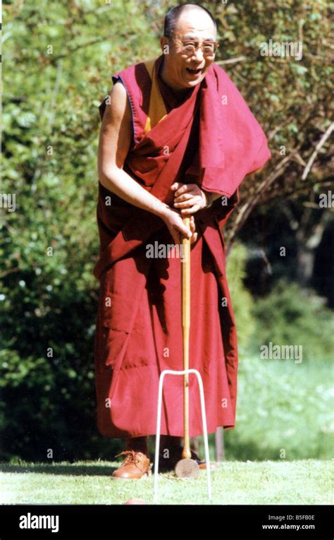 The Dalai Lama The Tibetan Spirtual Leader Playing Croquet At The