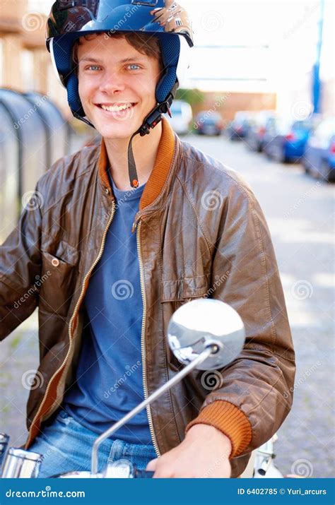 Happy Handsome Teenage Boy Riding A Motorcycle Stock Image Image Of