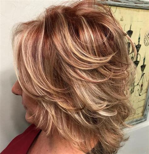 The layered and finely textured short hairstyle is for women with short hair and thin texture of hair. Shorter Feathered Red and Blonde Hairstyle | Modern ...