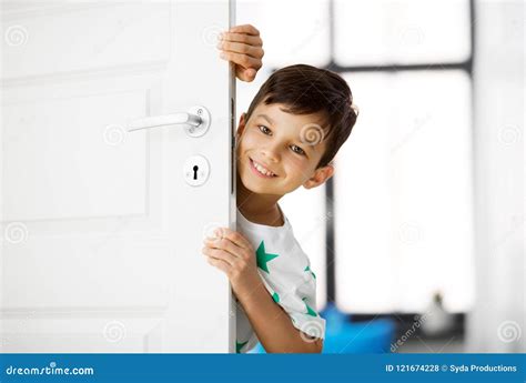 Happy Little Boy Behind Door At Home Stock Photo Image Of Person